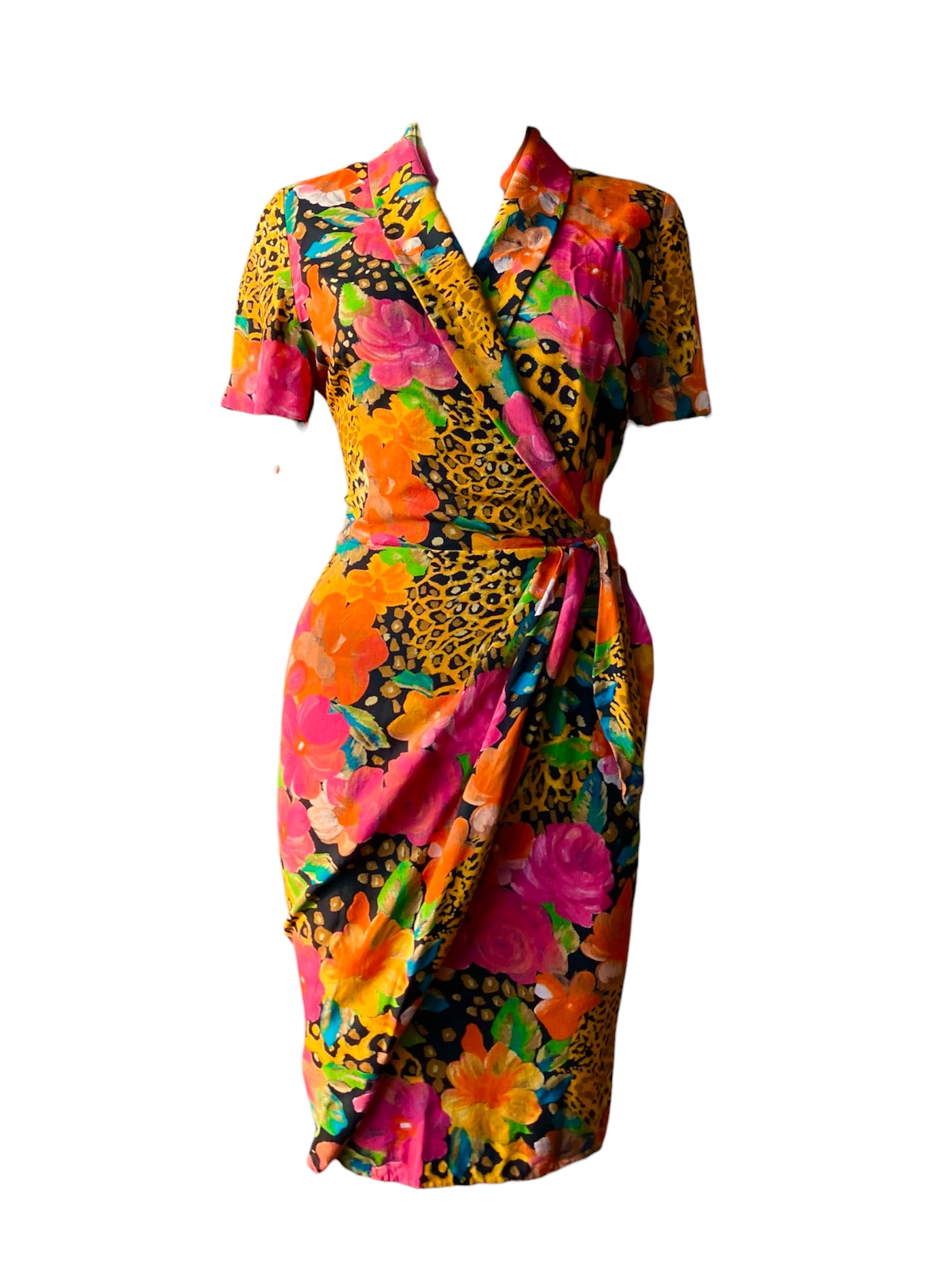 “NAOMI IN THE WILD” WRAP DRESS