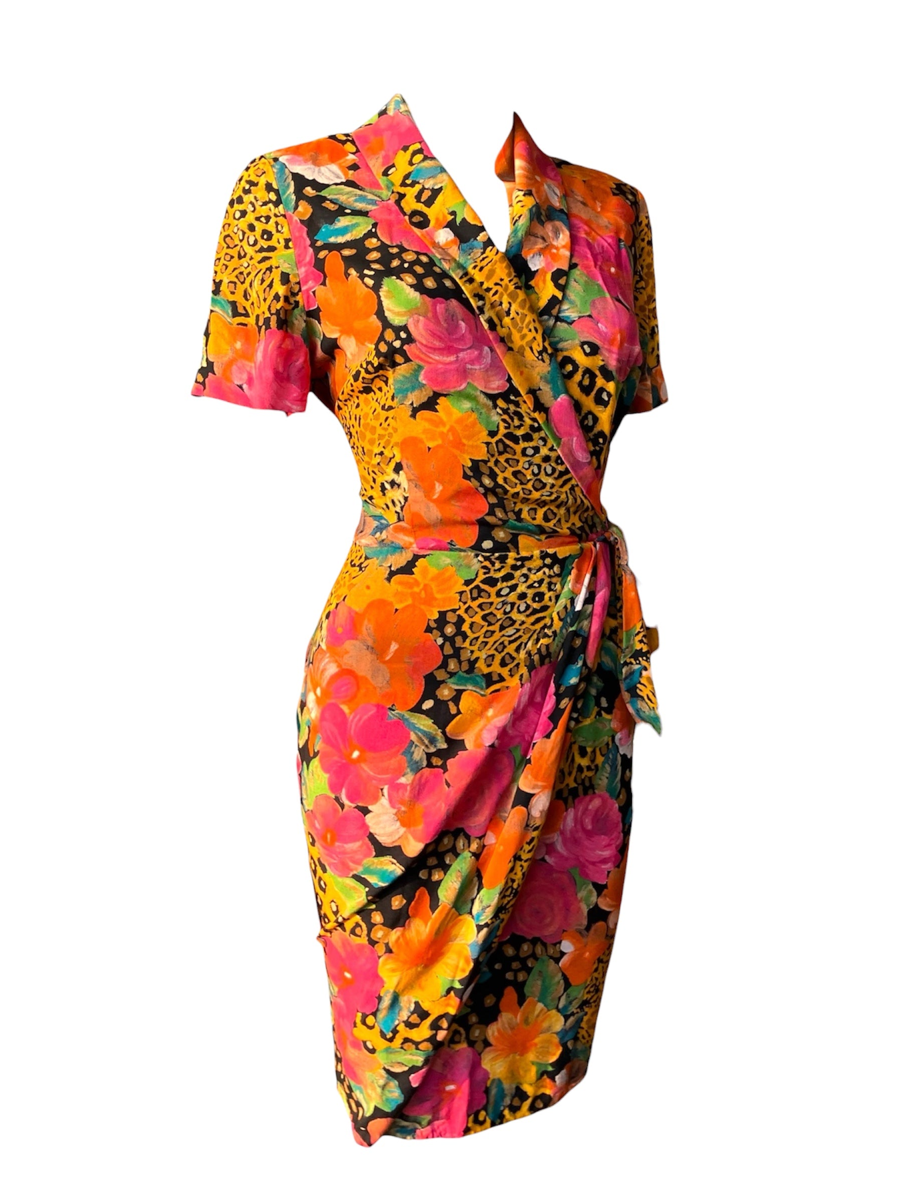“NAOMI IN THE WILD” WRAP DRESS