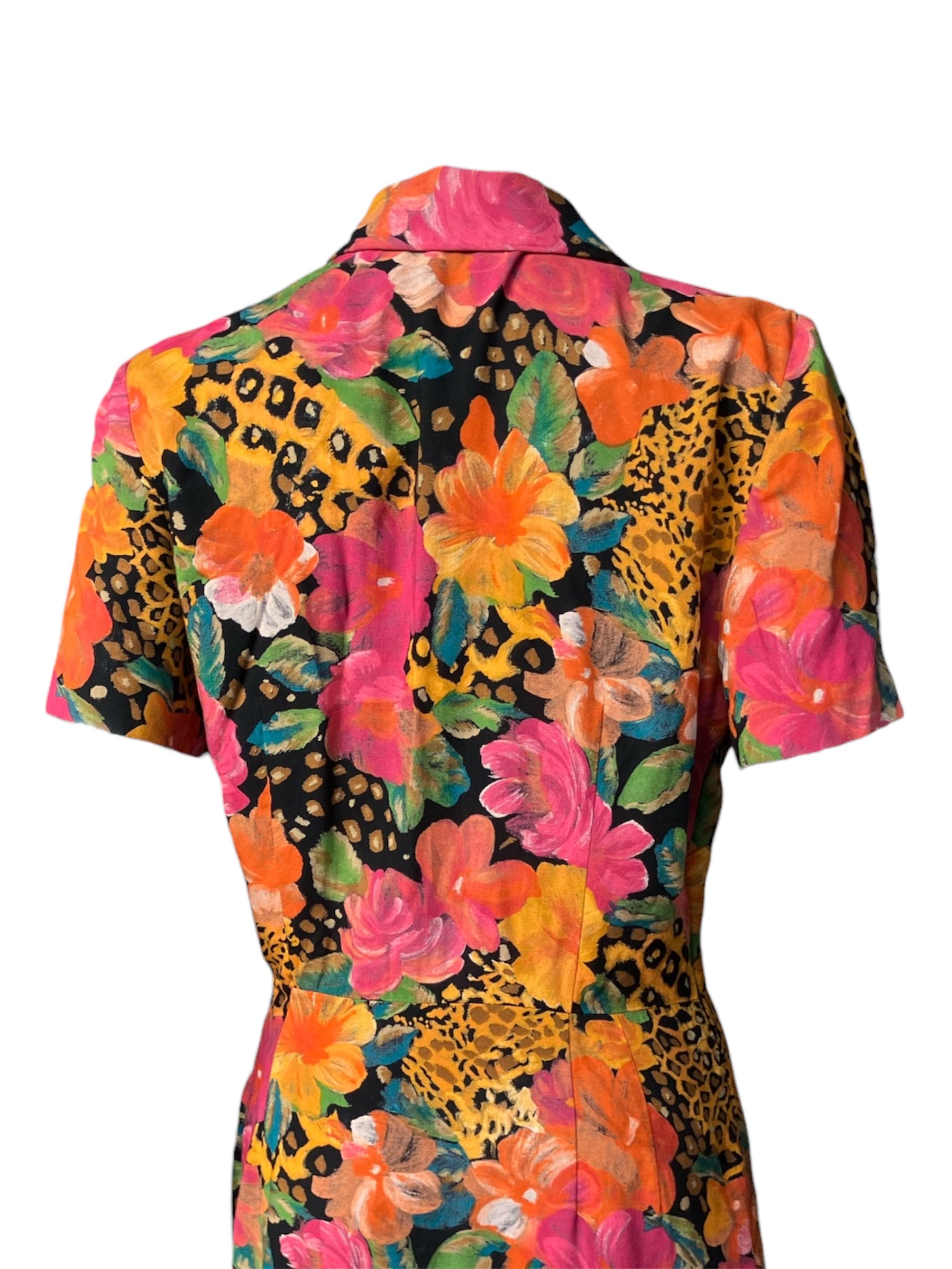 “NAOMI IN THE WILD” WRAP DRESS