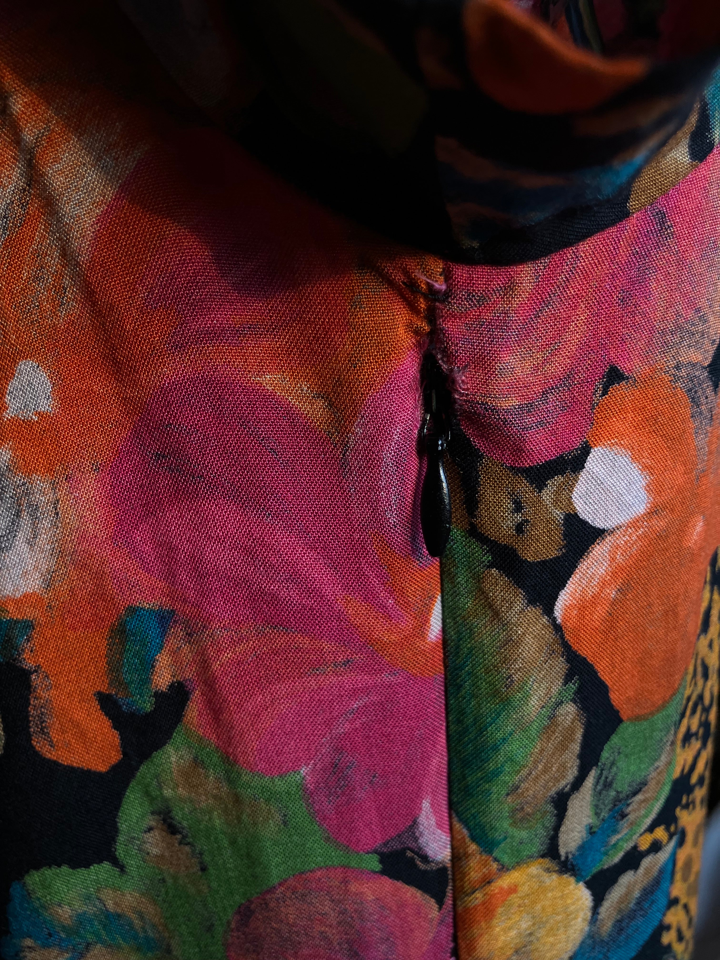 “NAOMI IN THE WILD” WRAP DRESS